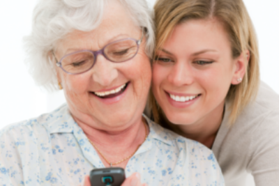 caregiver and senior patient smiling