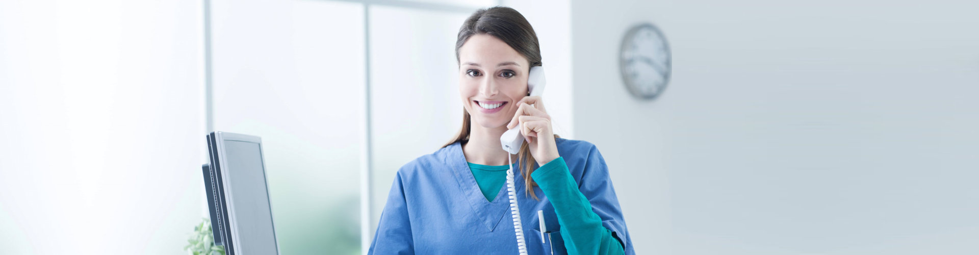 a caregiver woman on a telephone